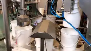 Rotary filling, sealing and closing machine model “CFM-2T” for packaging in 4 litre buckets (tubs)