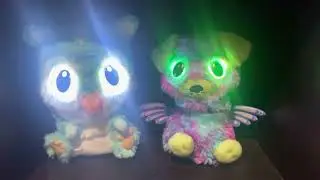 Blue/yellow Hatchibaby and purple/blue Hatchimal dog￼