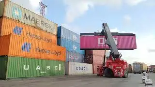 Kalmar Reach stacker with a tilting spreader for container handling