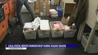 U.S. Postal Service workers deliver last minute holiday mail