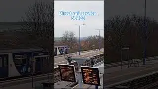66423 passing Swinton train station.