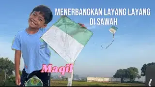 Menerbangkan Layang Layang di Sawah