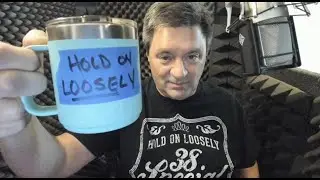Voice Over:  Hold On Loosely!