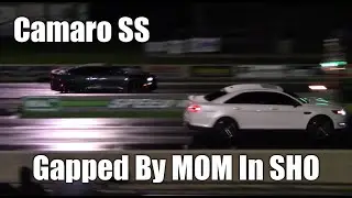 Mom in Ford Taurus SHO Gets Revenge On Camaro SS! 1/4 Mile Drag Race