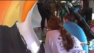 Sturgis middle school students use snowplow blades as a canvas