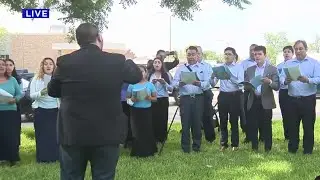 Light of the World Church Choir sings at memorial site of Uvalde shooting victims