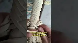 Craftsmen are handcrafting woven towing ropes for equestrian equipment
