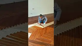 Masterful Herringbone Wood Flooring Installation Precision and Artistry in Motion