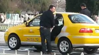 Taxi man cleaned his car with very small bucket of water probably for over 2 hours!