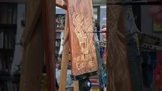 Scratched wood werewolf drawing