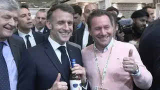 Macron receives a bottle of wine with 'For Sure' label inspired by his viral Davos appearance | AFP