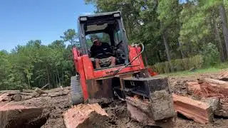 Skidsteer Upside down log splitter attachment.