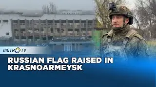 Russian Troops Raise Flag in Krasnoarmeysk Amid Ongoing Clashes