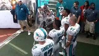 Miami Dolphins enter Sun Life Stadium's field to play the Falcons on 9/22/13