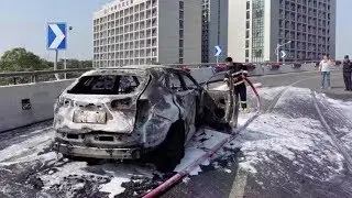 'Your car is on fire!' shouts driver as moving vehicle catches fire
