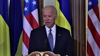 Biden tells Russia to fulfill Ukraine peace deal, return Crimea