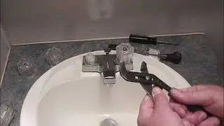 Ремонт и замена двухрычажного смесителя для ванной  