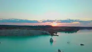 An artificial lake in chalk quarry view from dron