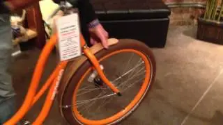 Orange Pedego Step Through Cruiser