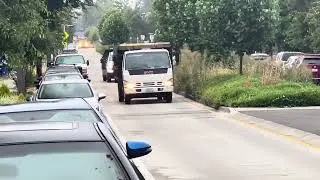 CMA CGM Truck Northbound and Seattle Public Utilities Truck Southbound (Meetup)