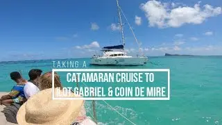 Taking a catamaran cruise to Ilot Gabriel & Coin de Mire