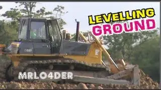 DOZER LEVELING GROUND - leveling dirt with dozer