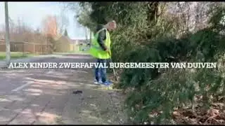 Alex kinder zwerfafval burgemeester van de gemeente Duiven