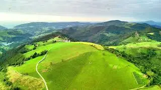 Captivating Aerial View of Beautiful Lush Green Hills and a Serene, Tranquil Landscape