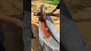 Traditional Chinese Stone Mill Grinds in Action