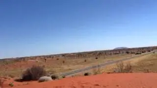 Playing on a sand dune in the Red Centre