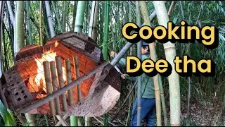 Cooking karenni USA Dee Tha (Sicking bamboo rice)