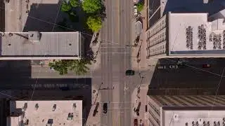 Lively urban scene and modern architecture of downtown area of an american city from above. Aerial