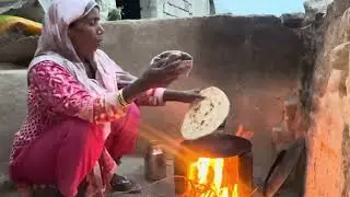 Mama cooking in desi style making bread 