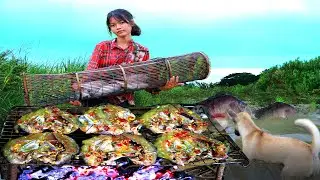 Cute dog and Beautiful girls Catch fish to cook their food