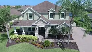 Waterfront Pool Home with 3 Car Garage Available for Purchase in West Viera Gated Community!