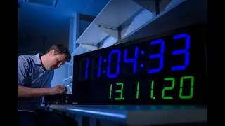 Quantum-Enhanced Clock Synchronisation over a Free-Space Channel
