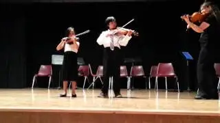 Dynamic Duo playing their string instruments