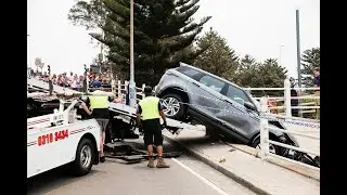 Luxury Range Rover crashes onto Bondi walkway