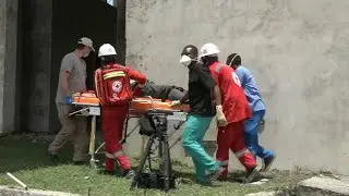 U.S. forces and Haitians team up for earthquake relief efforts in Haiti as death toll climbs
