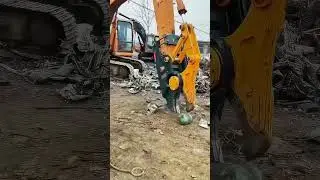 Steel Devourer in the Scrap Yard: Excavator Hydraulic Grab Operation Scene