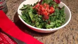 Spring greens in October with spinach minced tomato garlic salt and bragg's healthy vinaigrette.