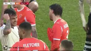 Blackpool&rsquo;s James Husband was shown a straight red card for his tackle.