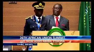 President Mugabe of Zimbabwe telling Ban Ki Moon the Secretary General of UN his mind