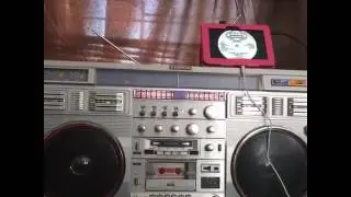 Conion C-100F portable stereo radio cassette recorder with an Kindle Fire line in aux