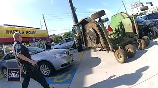 Bodycam: Suspect Driving Stolen Tractor Rams Cop Car in Waffle House Parking Lot
