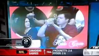 Guy chooses beer on kiss cam