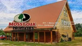 Custom Log Home in Mill Spring, MO listed by Mossy Oak Properties Mozark Realty