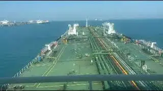 berthing a VLCC tanker in jetty port of basra oil terminal...