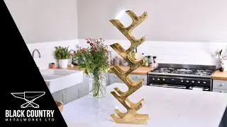 Gold 'Art Deco' 11 Bottle Wine Rack