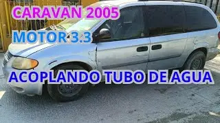 Bomba de agua y cambio de tubo de agua .Caravan 3.3, 2005